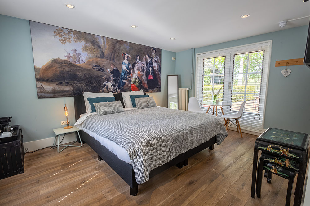 Slaapkamer en bed tuinsuite kasteel maurick
